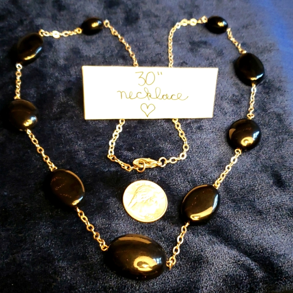 30 inch long black and silver statement necklace.